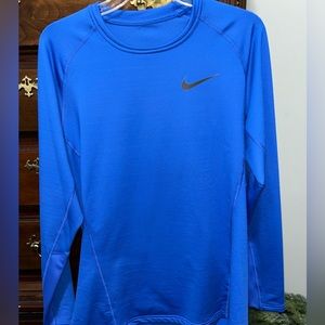Light weight blue Nike dri-fit. Under shirt